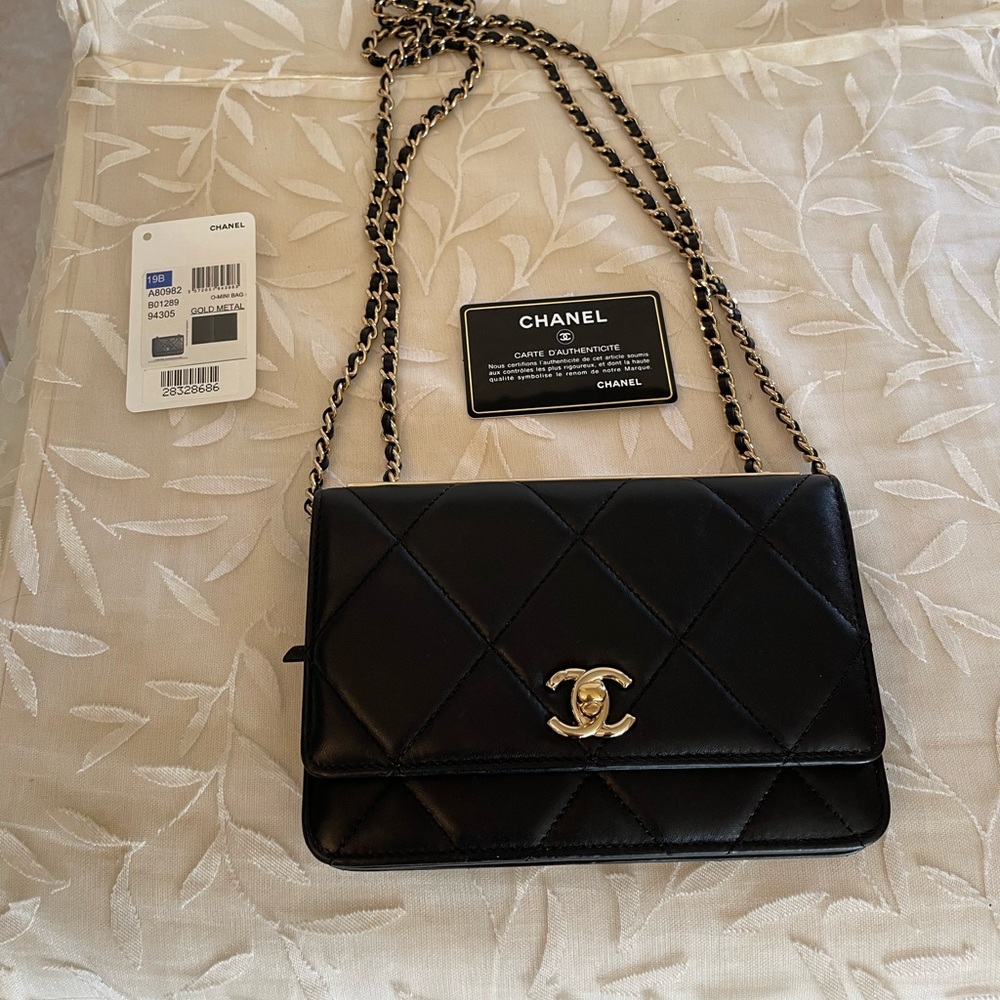 CHANEL logo lambskin quilted mini black flap bag